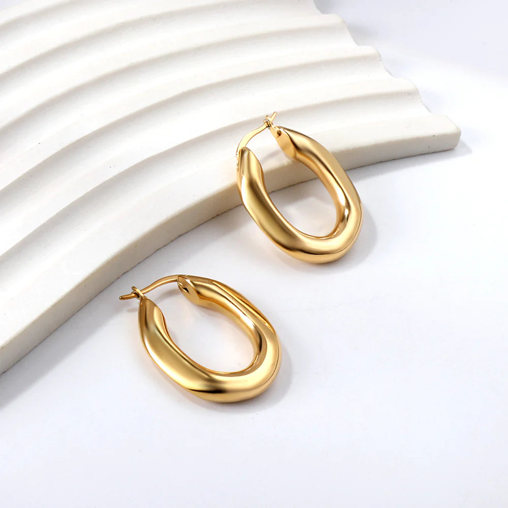 Bold Textured Golden Hoop Earrings (Hollow Oval)