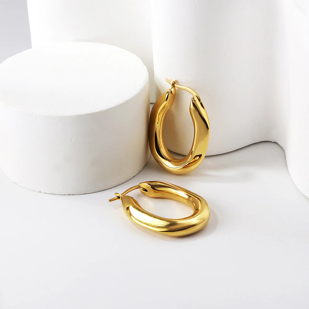 Bold Textured Golden Hoop Earrings (Hollow Oval)